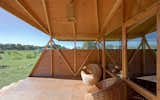 Outdoor, Wood Patio, Porch, Deck, Field, Grass, Trees, Back Yard, and Small Patio, Porch, Deck  Photos from Experience the Magic of Easter Island While Staying in a Modern Eco-Cabana