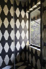 Graphic black and white cement tile was added in the renovation.