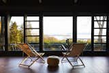 Windows The dark color contributes to the stunning Hudson views by creating a void in the foreground and highlighting the vistas.  Search “birds-and-blooms-of-the-50-states.html” from A Hudson Valley Home’s Renovation Is Guided by Its Best Midcentury Feature