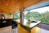 Kitchen, Drop In, Pendant, Recessed, and Table  Kitchen Recessed Table Photos from An Incredible Vacation Villa in the Balinese Jungle That’s Part Chameleon