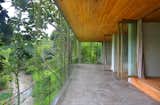 Outdoor, Concrete Patio, Porch, Deck, and Horizontal Fences, Wall  Photo 4 of 25 in vacation by Molly E. Osler, Interior Design from An Incredible Vacation Villa in the Balinese Jungle That’s Part Chameleon