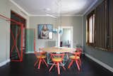 Table Cassina LC15 by Le Corbusier, Rival Chairs by Konstantin Grcic for Artek with Kvadrat fabric, bar cart by Rossana Orlandi,