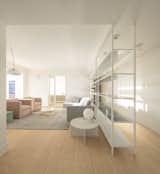 Living, Chair, Sofa, Light Hardwood, End Tables, Coffee Tables, Lamps, Ceiling, Floor, Table, Wall, Rug, and Storage  Living Storage Ceiling Chair Floor Photos from A Luminous Renovation in Portugal Creates a Bright and Airy Apartment
