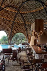 Dining Room, Table, Bar, Pendant Lighting, Chair, and Stools  Photo 12 of 15 in Stay in a Cocoon-Like Tent at a Safari Resort in Sri Lanka