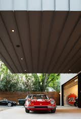 Exterior, House Building Type, and Metal Siding Material  Photo 6 of 21 in This Austin Home Was Designed to Showcase a Vintage Car Collection