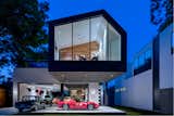 Exterior, House Building Type, Metal Siding Material, and Gable RoofLine  Photo 18 of 21 in This Austin Home Was Designed to Showcase a Vintage Car Collection