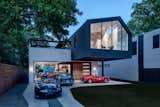 Exterior, House Building Type, Metal Siding Material, and Gable RoofLine  Photo 3 of 21 in This Austin Home Was Designed to Showcase a Vintage Car Collection