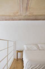 In Florence, walls have traditionally been painted yellow, but the design team decided to paint the renovated space white in order to brighten it up, while leaving the original ceiling frescos intact.&nbsp;
