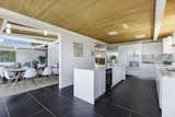 Kitchen, Wall Oven, White, Wall, Refrigerator, Undermount, Cooktops, and Beverage Center  Kitchen Beverage Center White Wall Undermount Photos from Spend the Night in an Iconic Case Study House North of San Francisco