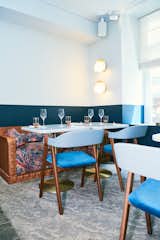 Dining Room, Table, Bench, and Chair  Photos from A New Israeli Eatery in Paris Serves Up Mediterranean Style