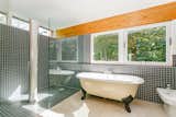 Bath Room, Freestanding Tub, Open Shower, Corner Shower, and Ceramic Tile Wall  Todd Hancock’s Saves from A Modernist Time Capsule by Erno Goldfinger Asks $4M