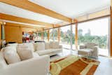 Living Room, Sectional, Chair, Ottomans, Rug Floor, and Wall Lighting  Photo 14 of 20 in A Modernist Time Capsule by Erno Goldfinger Asks $4M