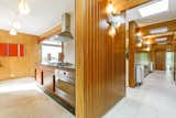 Kitchen, Wall Oven, Range, Wood, Wall, Ceiling, Range Hood, and Subway Tile  Kitchen Subway Tile Wood Range Hood Wall Photos from A Modernist Time Capsule by Erno Goldfinger Asks $4M
