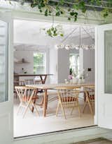 An Amagansett cottage in the Hamptons was transformed with a white and bright Scandinavian-inspired interior. Jessica Helgerson Interior Design freshened up the dated interior, while the architecture firm TBD Design Studio developed a new floor plan.