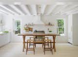 Taking cues from their style-conscious clients, Portland-based Jessica Helgerson Interior Design transforms an Amagansett home into a light-filled, Scandinavian-inspired getaway. The&nbsp;kitchen&nbsp;expanded to a location where there had been a screened-in porch, increasing its interior footprint.