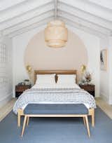 Bedroom, Lamps, Light Hardwood, Bed, Pendant, Wall, Bench, Night Stands, and Rug  Bedroom Wall Light Hardwood Lamps Bench Photos from A Hamptons Beach Retreat Gets a Scandinavian-Style Makeover