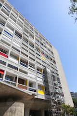 Exterior, Flat RoofLine, Concrete Siding Material, and Apartment Building Type  Photo 1 of 12 in You Can Rent a Renovated Studio in Le Corbusier's Famed Cité Radieuse