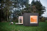 Exterior, Cabin Building Type, Tiny Home Building Type, Flat RoofLine, and Wood Siding Material  Photos from These Off-the-Grid Cabins in Belgium Keep Their Locations Secret Until You Book