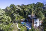 Outdoor, Trees, Swimming Pools, Tubs, Shower, Large Patio, Porch, Deck, Hardscapes, Walkways, Gardens, and Back Yard Casa Meleku.  Photos from Slip Away to These Sleek New Villas in a Costa Rican Forest