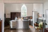 Kitchen, Wood, Medium Hardwood, and Metal The kitchen layout takes consideration to a chef's needs.  Kitchen Medium Hardwood Metal Photos from A Converted 19th-Century Church in the English Countryside Asks $923K
