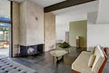 The split rock fireplace is just one of the pristine original midcentury details this home has to offer.