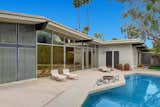 The pool area showcases a Pebble-tec saltwater pool, fountain, succulent garden, and fire pit.&nbsp;