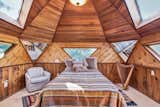 Watch the stars through triangular windows in the domed bedroom.&nbsp;