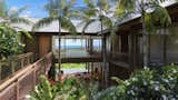 Exterior, Beach House, Gable, Wood, and Metal The home has a strong relationship with the land that is in harmony with the tropical environment.  Exterior Metal Beach House Gable Wood Photos from A Breezy Hawaiian Residence by Olson Kundig Hits the Market at $6.95M