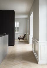 Classic moldings were preserved, adding a historic flavor, while playing off sleek, contemporary touches.&nbsp;