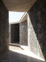 The diagonal patios and sloping roof create angular shadows.&nbsp;