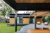 The steel-framed platforms are largely open to the elements.  Photo 2 of 10 in This Modern Prefab Is Now a Gorgeous Guest House