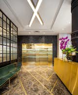 The lobby now houses a vibrant mix of granite and gold.&nbsp;