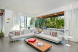 Living, Slate, Coffee Tables, Table, Sectional, End Tables, and Recessed The den opens up to the pool area.  Living End Tables Table Coffee Tables Recessed Photos from A Renovated Harry Gesner–Designed Midcentury in L.A. Wants $9.4M