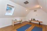 An upstairs yoga practice space.