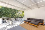Outdoor, Back Yard, and Concrete Patio, Porch, Deck The covered entertaining space.  Search “outdoorlocations--back-yard” from Moby Lists His Newly Renovated Los Feliz Manor For $4.5M