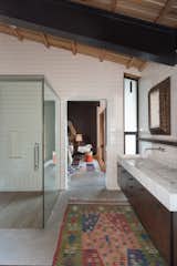 An ensuite bathroom is shared by two of the bedrooms.