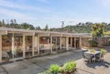 Exterior, House Building Type, Mid-Century Building Type, Flat RoofLine, and Glass Siding Material A wall of windows lines the rear of the home.  Photo 20 of 21 in An Elegant Eichler Hits the Market at $1.15M in Northern California
