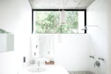 Bath Room, Pendant Lighting, Concrete Wall, Open Shower, and Undermount Sink The bathroom maintains a sense of outdoor living with the large clerestory window.  Photo 9 of 14 in Rent This Modular Micro Cabin For Your Next Grecian Getaway