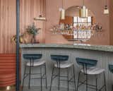 Dining Room, Chair, Stools, Pendant Lighting, Bar, and Bench Assorted brass pendant lighting over the terrazzo bar.  Photos from A Historic London Property Is Converted Into a Modern Mediterranean Eatery