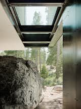 The home cantilevers out over a giant boulder which was originally found on the site and incorporated into the design.&nbsp;