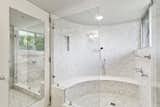 Bath Room, Mosaic Tile Wall, Enclosed Shower, and Ceiling Lighting The large enclosed shower in the master bath.  Photos from Modernist Charles Gwathmey's Personal Hamptons Home Asks $4.85M