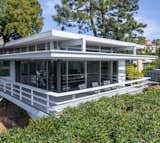 Exterior, Glass Siding Material, Metal Siding Material, House Building Type, Mid-Century Building Type, Flat RoofLine, and Metal Roof Material Clerestory windows add to the clean, modernist vibe.  Photos from Rooney Mara Asks $3.45M For a Restored Midcentury Stunner in L.A.