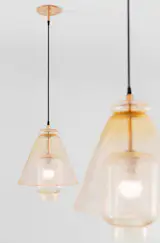 The kitchen lights were designed by August and custom-made by a local glass blower.