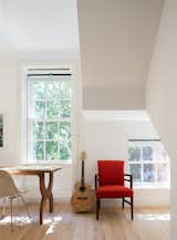 Office, Chair, Desk, Medium Hardwood Floor, and Study Room Type The study is punctuated by a red accent chair.  Photo 18 of 32 in Before & After: A Historic Tribeca Townhouse Gets a Magical Makeover