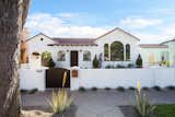 Exterior, Tile Roof Material, Gable RoofLine, Stucco Siding Material, and House Building Type  Photo 20 of 20 in An Updated Spanish-Style Abode with an Artist Studio Hits the Market at $1.1M in L.A.