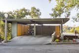 Garage and Detached Garage The pop of orange as an accent color is picked up in the carport.  Garage Detached Garage Photos from Mad Men Producer Puts His Pasadena Midcentury Up For Auction Starting at $1.7M