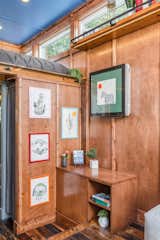 Storage Room and Cabinet Storage Type Shelving and storage was added as space allowed.  Photo 9 of 12 in This Tiny Home and Writing Studio Was Invented for a Children’s Author
