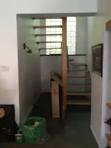 Another congested, dark area in the home was the staircase.

  Photo 11 of 21 in Before & After: A Century-Old Row House in Montreal Gets a Glorious Renovation