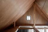 The open attic creates an airy sense of space for the lower levels, and offers more room for storage.&nbsp;
