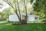 Exterior, Small Home Building Type, Brick Siding Material, Flat RoofLine, Mid-Century Building Type, and Wood Siding Material The backside of the guest house.  Photo 9 of 10 in Own a Sleek Midcentury Abode by Iconic Architect Eliot Noyes For $2.75M